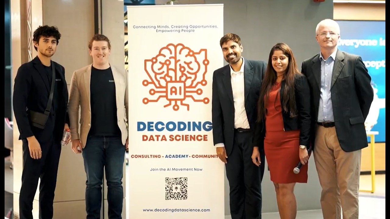 Five speakers standing beside a Decoding Data Science banner at the DIFC Innovation Hub in Dubai.